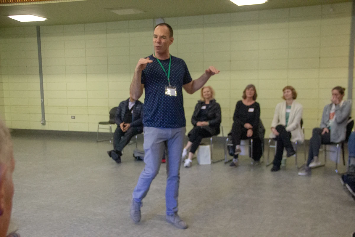 Rob Sarison leading an interactive workshop with seated participants